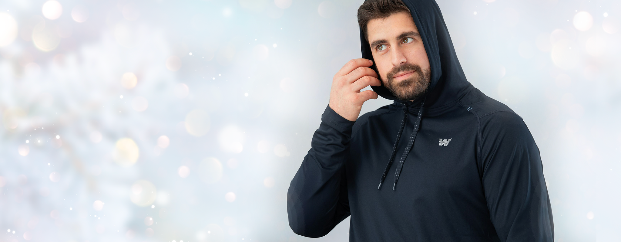 Man wearing Weatherman Sun Shirt in midnight blue with the hood on.